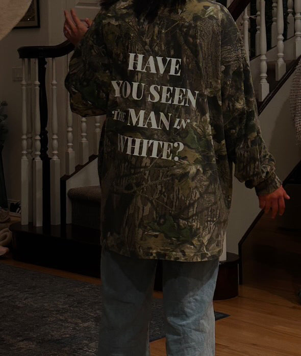 Camouflage man in white long sleeve
