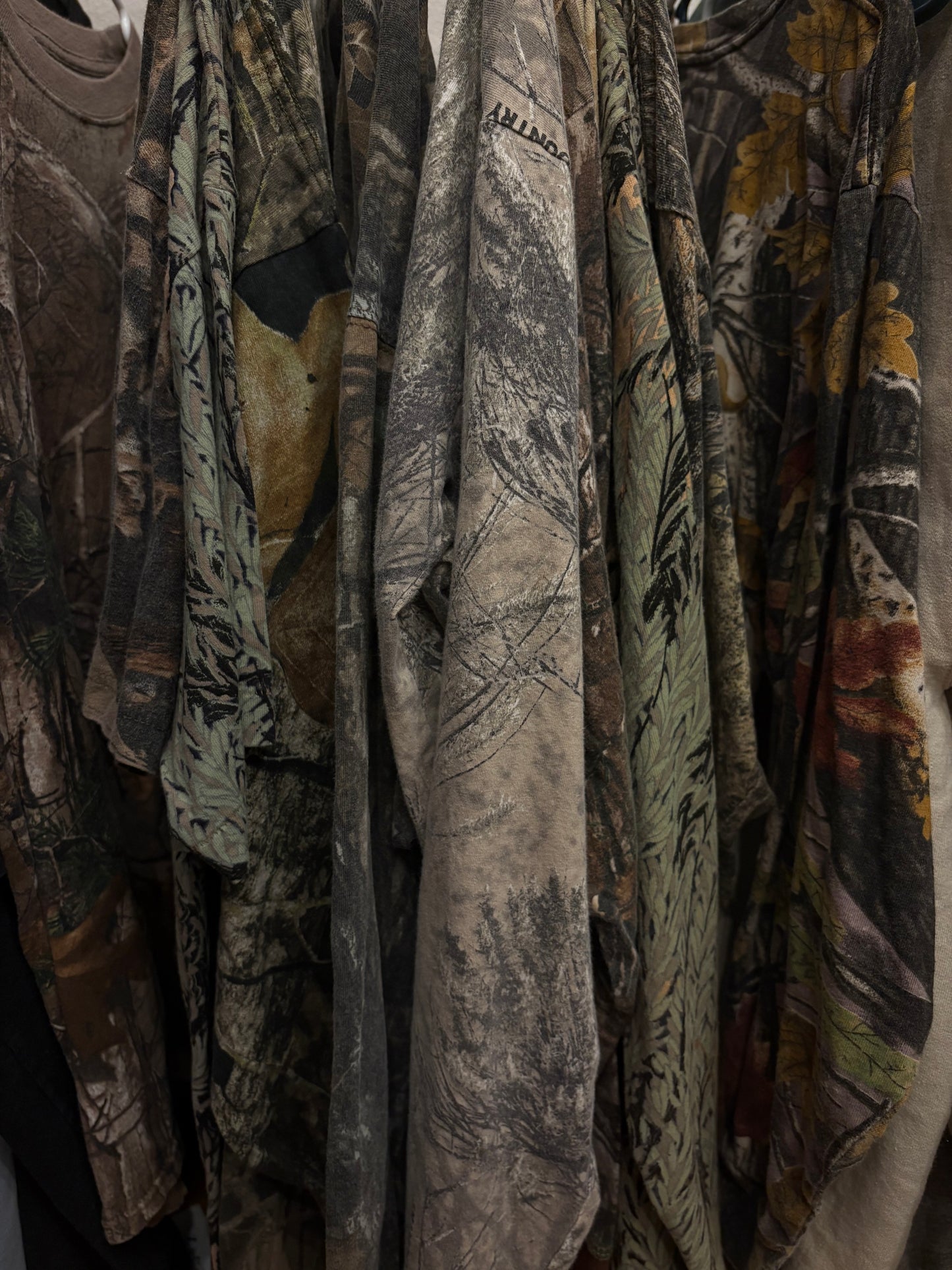 Camouflage man in white long sleeve