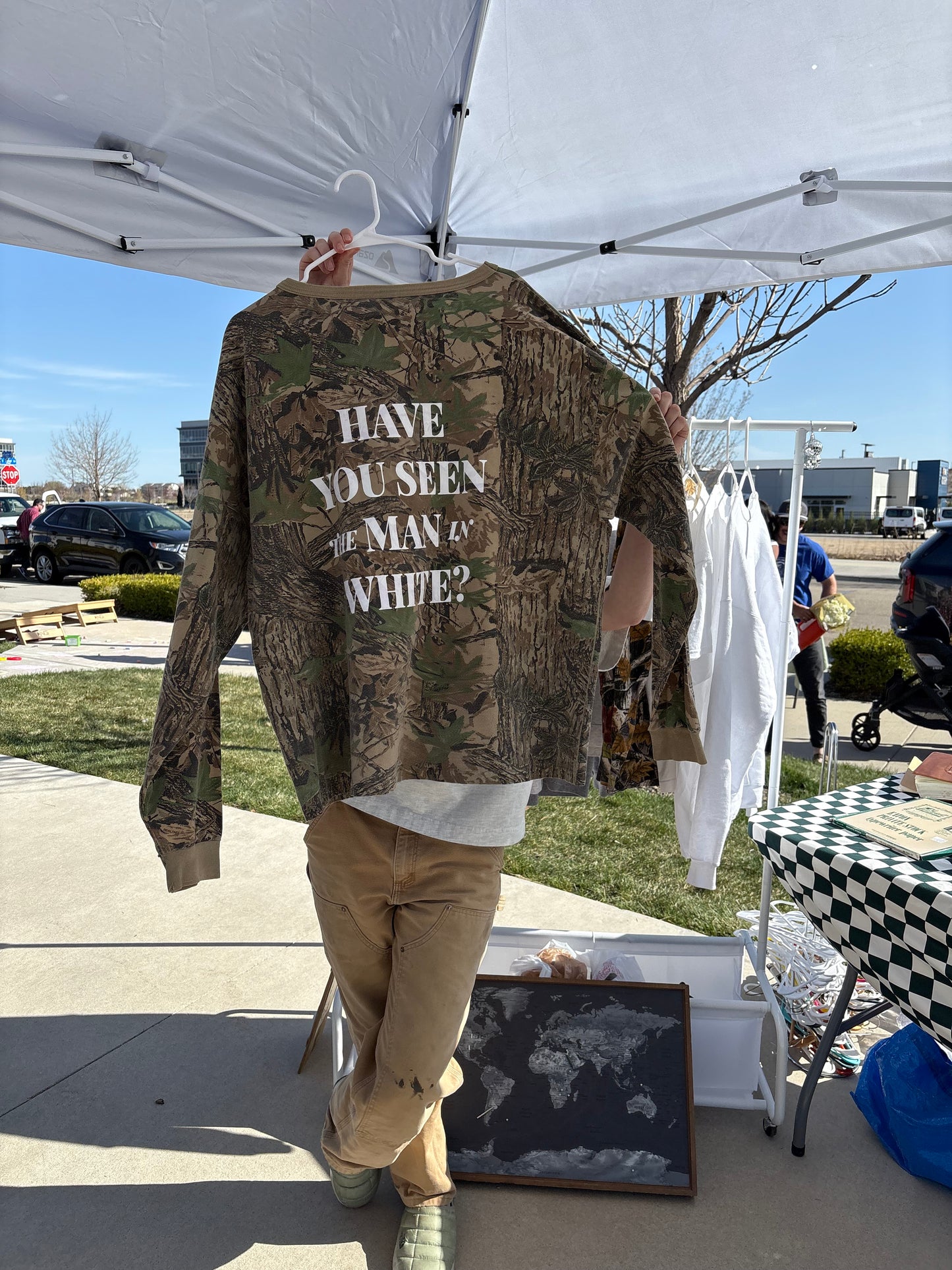 Camouflage man in white long sleeve